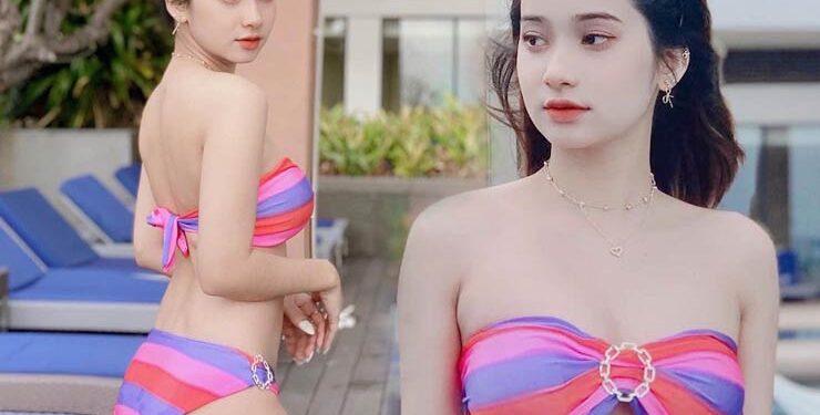 Nữ sinh Kinh tế khoe dáng đẹp nõn nà với bikini màu sắc